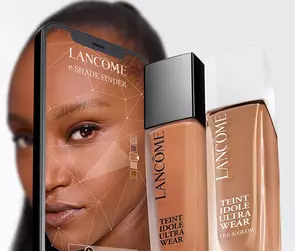 Model with E-Shade finder, Lancome’s foundation shade finder for an accurate foundation match