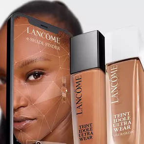 Model with E-Shade finder, Lancome’s foundation shade finder for an accurate foundation match