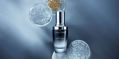 A bottle of Advanced Genifique Face Serum for a healthy skin moisture barrier with skincare ingredients including hyaluronic acid vitamin cg and bifidus prebiotic