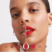 Model with lipsticks and several shades