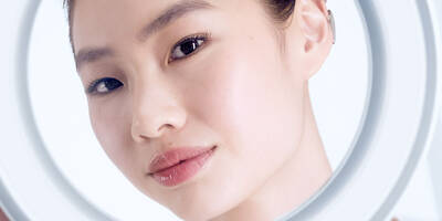 Woman with dark spots on face