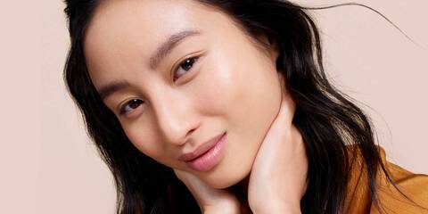 Model with Glowing Makeup showing How to Get Glowing Skin with a Dewy Foundation