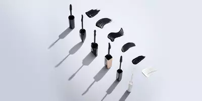 Mascara wands open to show the mascara brush types, curved, oversized and comb wands for comparison