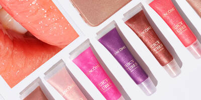 Juicy Tubes Lip Gloss in purple, pink, brown, nude, and fuchsia lip gloss shades.