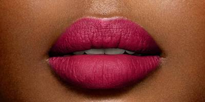 Bright Cool Fuchsia Pink lipstick worn on dark skin