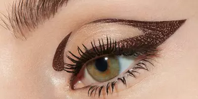 Metallic Brown Eyeliner worn in a cut crease graphic eyeliner shape