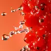 Red berries with splashing water.