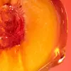 Close-up of a cut peach.